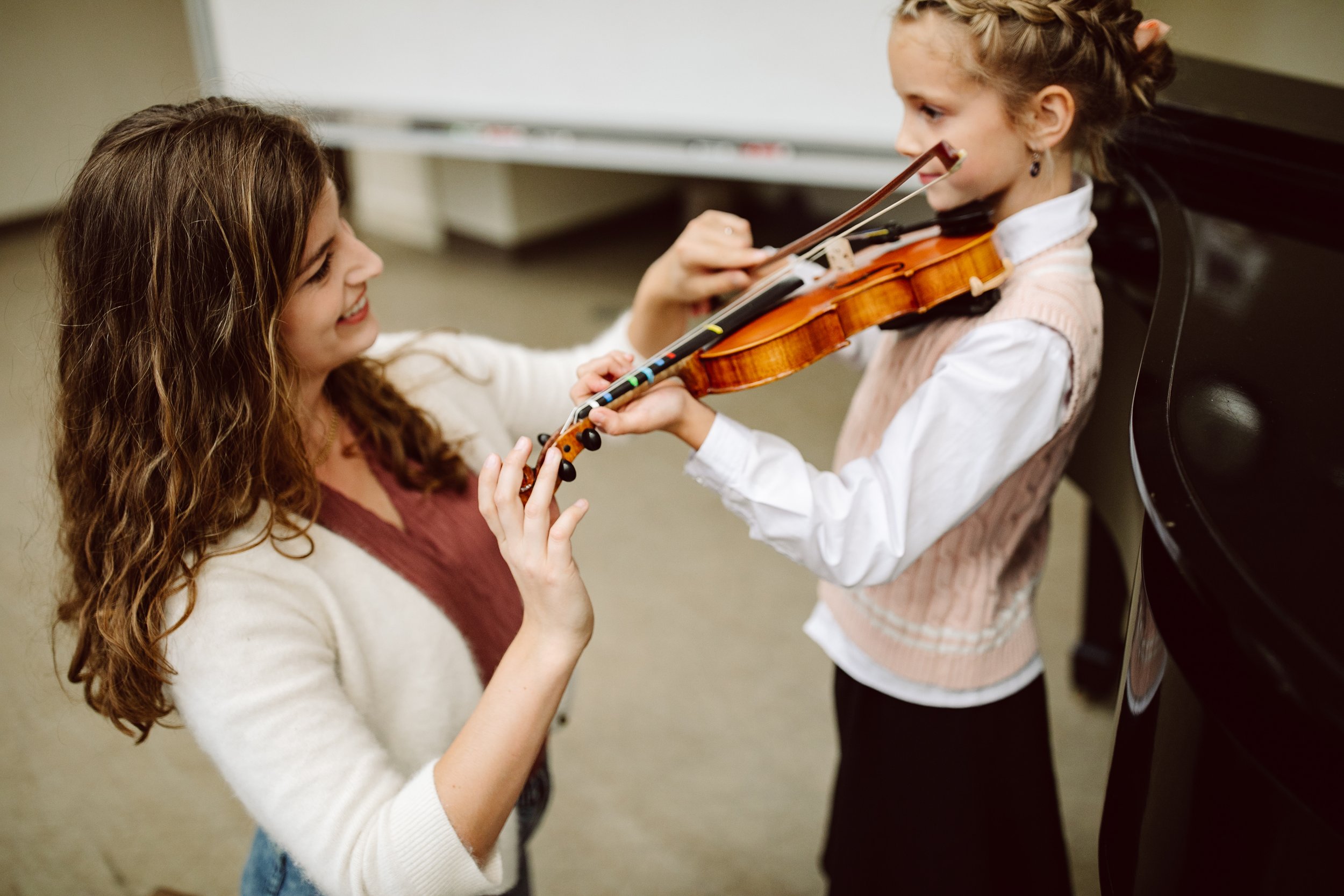 violin teacher and violin student
